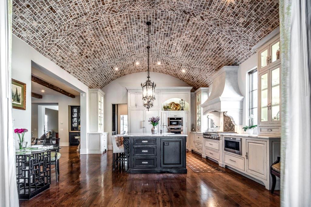 Custom built with no detail overlooked! Transitional and stunning! Incredible setting on +/- 2 acres. Master suite on main, area above garage easily finished for 5th bdrm. Gorgeous cooks kitchen with brick barrel ceiling (plus large caterers kitchen) opens through accordion doors to incredible screen porch overlooking saltwater pebbletech heated pool and flat walk out back yard. French doors from great room to covered porch with fireplace. 1.1 miles north of Chastain Park, Sandy Springs taxes. Built with "Aercon" block, 10" plank reclaimed white oak flooring, 11-14' ft ceilings on main, Ludowici tile roof, 3 car garage, tremendous architectural detail. Elevator shaft. Too many outstanding characteristics to list. This is a rare opportunity. There are very few homes built to these standards and with such a fabulous result.