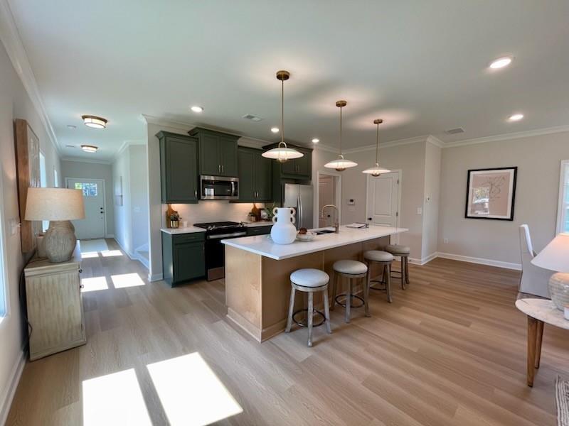 Welcome to Lot 23 The Fairview G plan READY December/ January . Where comfort meets style in a relaxed, inviting atmosphere! This home boasts 4 bedrooms, and 2.5 baths, with a gorgeous exterior that catches the eye from the moment you arrive. Inside you will find a beautiful kitchen featuring a large island perfect for entertaining The living area is warmed by an electric fireplace, creating a cozy ambiance for gatherings or quiet nights in. Hardwood stairs leads you to a cozy spacious Owner's bedroom large walk-in closet, and luxurious shower with a bench seat offering a spa like escape after a busy day. 3 additional bedrooms, 1 full bath, and the laundry room complete the upper lever. Discover the perfect blend of charm and functionality in lot 28, The Fairview U Plan where every detail is designed for modern living at its finest!.. Great location and excellent school district. Close to shopping entertainment, 1 mile to Dupree park and 3miles to Downtown Woodstock! Call today to schedule an appointment to view our lots and plans. Come make this house your home and build equity as one of our first homeowners! Images of home are examples of floor plan colors and selections may vary. Hurry while there is still time to customize your interior finishes at our Amazing Design studio!