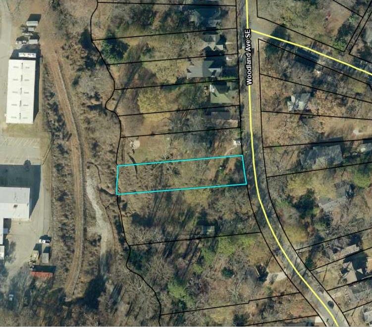 Please drive by lot to see the potential.