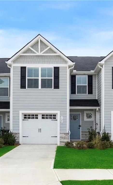 This beautiful, one-year-new townhome is perfectly situated just off Hwy 411, with convenient access to I-75 and Hwy 41. Featuring an open-concept layout, the home offers a bright, modern kitchen complete with granite countertops and a stylish tile backsplash. Plantation shutters add charm and privacy, while upgraded faucets provide a touch of sophistication. Upstairs, you’ll find a spacious owner’s suite along with two additional bedrooms and a full bath—totaling 3 bedrooms and 2.5 bathrooms. A one-car garage offers added convenience, and the refrigerator, washer, and dryer remain with the home. With its fresh feel, functional layout, and premium location near shopping, dining, and major highways, this nearly new townhome is must-see!!!
