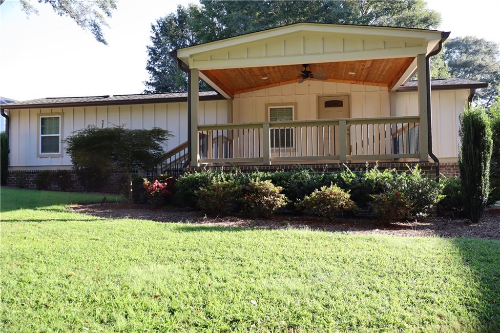 Charming Renovated Tiny Home in Downtown Flowery Branch – Available 10/01/2025
Beautifully renovated two-bedroom, one-bath home in the heart of downtown Flowery Branch. Enjoy the convenience of walking to the amphitheater, farmers market, shops, and dining. Inside, the home offers a cozy kitchen, family room, and a hallway laundry area. A covered front porch is perfect for listening to Sunday music from the amphitheater, while the large back deck provides a private outdoor retreat.
The oversized gravel driveway allows room for boat or RV parking, and the landscaped yard includes a spacious shed ideal for storage, workshop, or hobby space. Rent is $1,500 per month with a 12-month minimum lease; an incentive is available for a 24-month lease. Due at signing are first month’s rent, last month’s rent, and a security deposit equal to one month’s rent. The application fee is $55 per person, maximum occupancy is two, and tenants must be 18+ with good rental history. Landscaping and pest control are included in rent. Utilities—Flowery Branch Water, GA Power, and AT&T services—are tenant responsibilities.