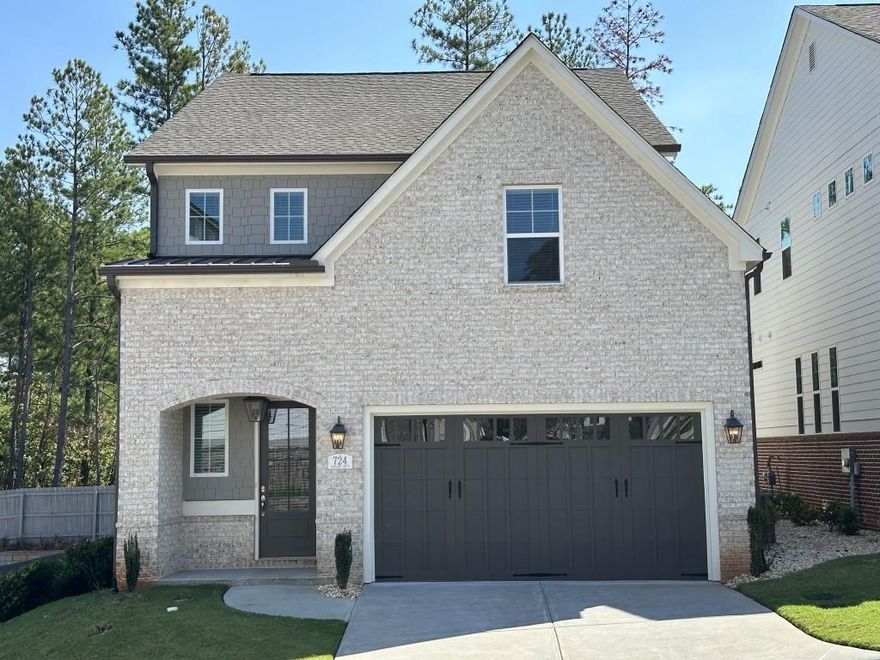 The Ashley Plan built by Heatherland Homes! Now Available at Promenade Ridge! Step into this stunning Model Home, meticulously designed to elevate your lifestyle with effortless luxury and timeless elegance. Nestled just minutes from the charming Marietta Square, this home combines unparalleled convenience, comfort, and breathtaking views. Expansive Living Spaces: Soaring 10-foot ceilings and gleaming hardwood floors set the tone for sophistication on the main level. Dream Kitchen: Unleash your inner chef in a gourmet kitchen featuring sleek modern appliances, quartz countertops, an oven/microwave combo, a built-in gas range, and soft-close cabinetry. The oversized island is perfect for entertaining or creating culinary masterpieces. Luxurious Primary Suite: Located on the main floor for ultimate convenience, the suite boasts a spa-like bathroom and a spacious walk-in closet for all your wardrobe needs. Designer Touches: Elegant trim, stylish finishes, and thoughtful upgrades infuse every corner with beauty and functionality. Step outside and experience tranquility just moments from the city's vibrant heart. Whether hosting friends or savoring quiet moments, this home is your personal retreat. For golf enthusiasts we are located within walking distance to the famous Mareitta City Club Gold Course. Quick Move-In! Don't miss this rare opportunity to own a Model Home filled with tasteful upgrades. Schedule your tour today and start living the life you've imagined! Ask us about $10,000 seller paid closing costs with the use of the preferred lender with binding contract by 06/30/2025.