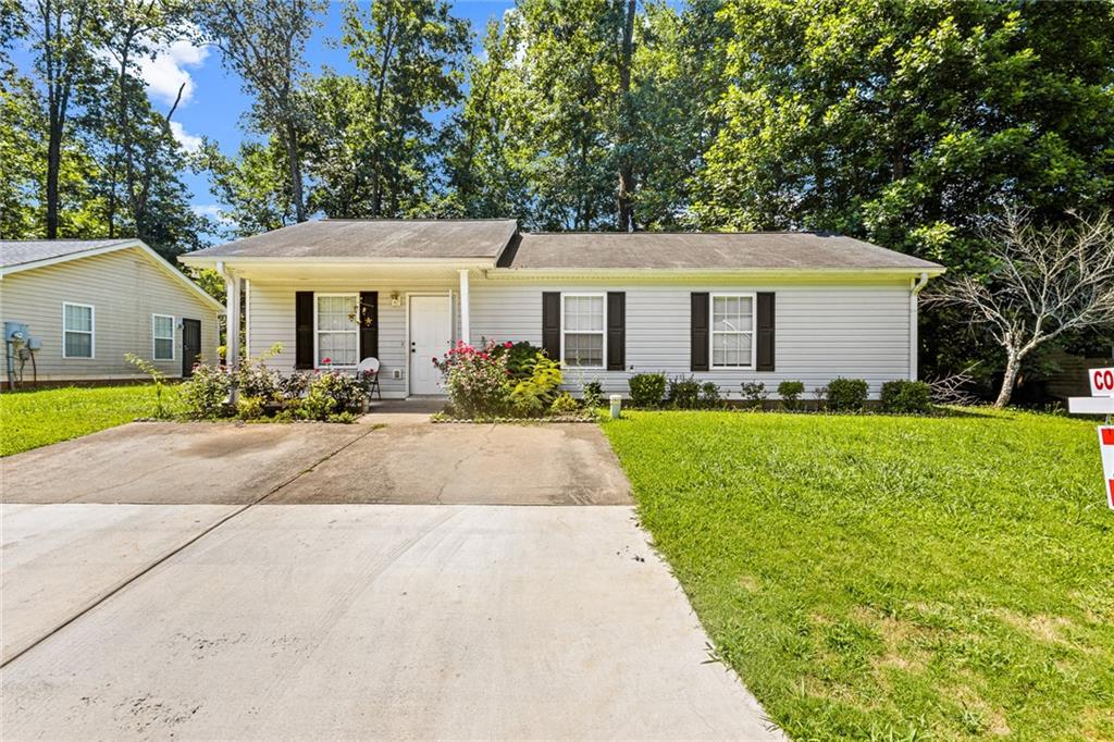 Welcome to this charming ranch-style home nestled on a quiet cul-de-sac in Mableton. Perfect for investors or first-time buyers. This property features updated appliances, brand-new flooring, and a spacious layout that offers comfort and functionality. An added bonus is the spacious storage unit conveniently located on the side of the home that is ideal for tools, equipment, or extra belongings. With its solid structure and recent upgrades, this home offers great potential for rental income or resale. This home is Located minutes from shopping, parks, and major highways, this property combines value with location. Don't miss out on this move in ready investment opportunity!