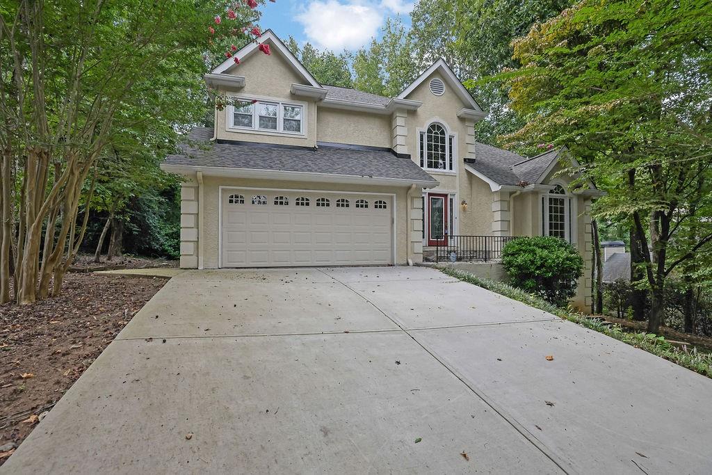 Welcome to this beautifully maintained two-story home offering 4 bedrooms, 2.5 bathrooms, and exceptional living space throughout. Step inside to a dramatic two-story foyer that opens into a large formal living and dining area—perfect for entertaining guests or enjoying quiet evenings at home.
The heart of the home is the eat-in kitchen, featuring a full breakfast bar, sleek stainless steel appliances, and a clear view into the main family room. Gather around the cozy fireplace in the family room, a warm and inviting space ideal for relaxing with loved ones.
Upstairs, you'll find an oversized master suite boasting a spacious en-suite bath complete with separate vanities, a whirlpool tub, a walk-in closet, and elegant finishes. Three additional bedrooms offer ample space for family, guests, or a home office.
Crown molding and decorative trim throughout the home add a touch of classic charm, while the full walk-out basement provides endless potential for additional living or recreational space.
Enjoy the outdoors on the large, oversized back deck—perfect for grilling, entertaining, or simply taking in the view.