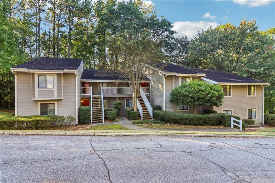 Perfect location in East Cobb & super close to The Battery. This updated 2 BR 2 Bath condo is move in ready for you to simply enjoy life. With a beautiful kitchen with all stainless steel appliances featuring granite countertops, great cabinets and large eating area as you enjoy views of the great room and fireplace. All the windows have wooden shutters along with hardwood flooring throughout. The one bedroom has large walk-in closets with lots of storage space. When the upgrades were done all the ceiling are flat without texture. Recessed lighting enhances your experience. The HVAC was replaced in October2024, the HOA replaced all plumbing lines in June 2024.  This unit is stepless which is a plus for many. The community is active and just 2.3 miles  to Braves games, concerts and the great activities at the Battery. This is a must see unit and we welcome your showings!