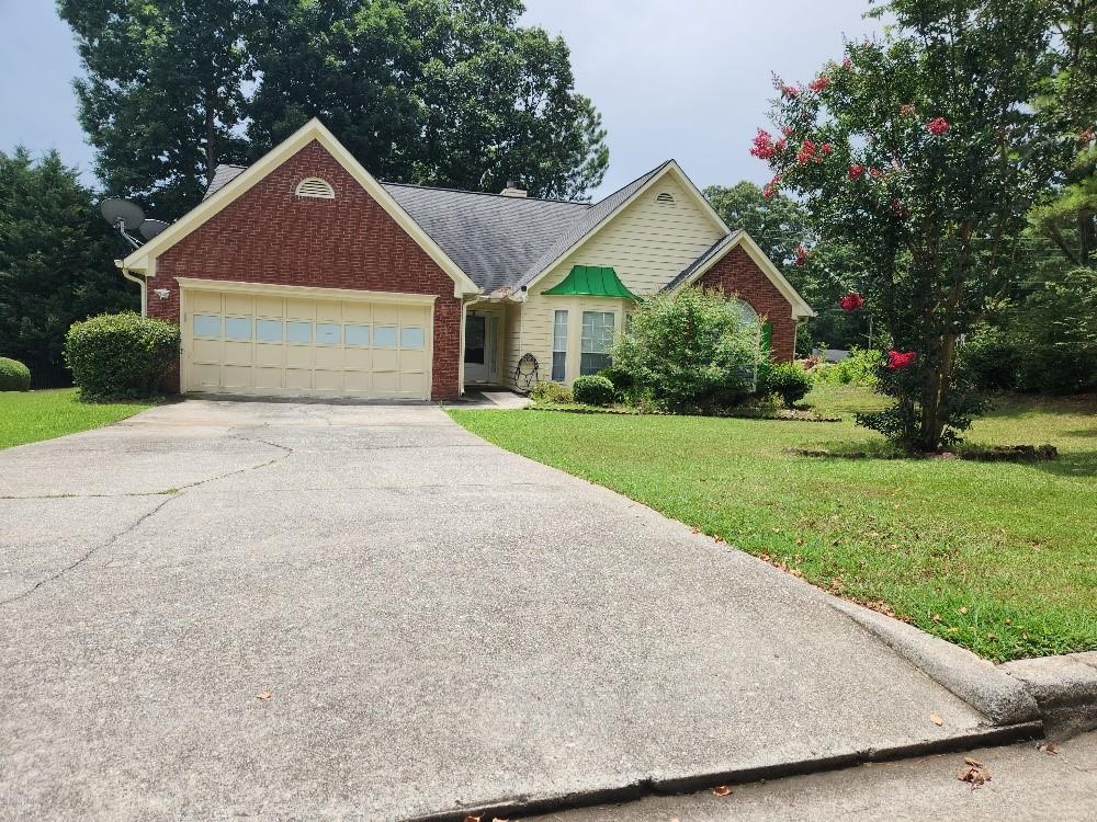 Easy to access from I-85 to old Peachtree Rd, Peachtree Ridge H.S cluster, an incredible opportunity to own!!! in Lawrenceville, Easy access to Sugarloaf & Hwy 316, I-85, schools, parks, shopping & restaurants. Great Location beautiful ranch 3bed 2 full baths with gardened, end unit. Brick front and cement wood siding, extra huge sunroom and private back yard. GARAGE/OUTBUILDINGS & huge yard Large Family room & Master suite all other room are bright sunny and bid. Gleaming flooring throughout, Extended Level Driveway, white cabinet and island bar convenient kitchen, You will love this home. NO HOA!!!
