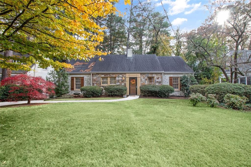 **ALSO AVAILABLE FURNISHED FOR $3,400/MO** Charming Bungalow in Buckhead's coveted Ridgedale Park! Located within the esteemed Sarah Smith School district, just minutes from an array of shopping, dining, and entertainment options, this home offers the epitome of Atlanta Living! Step inside to a cozy, country club-inspired living room featuring a classic fireplace and original hardwood floors that bring a timeless warmth to the space. The main level hosts three generously sized bedrooms and two full bathrooms, providing ample space for rest and relaxation. The unfinished basement offers tons of storage or the chance to create a space that suits your needs. Sitting on a generous lot, the backyard is a dream—spacious, private, and ready for everything from gardening to weekend hangouts. The screened-in porch is your go-to spot to kick back and relax. Prime location to Phipps Plaza, Lenox Mall, I-400, and more!