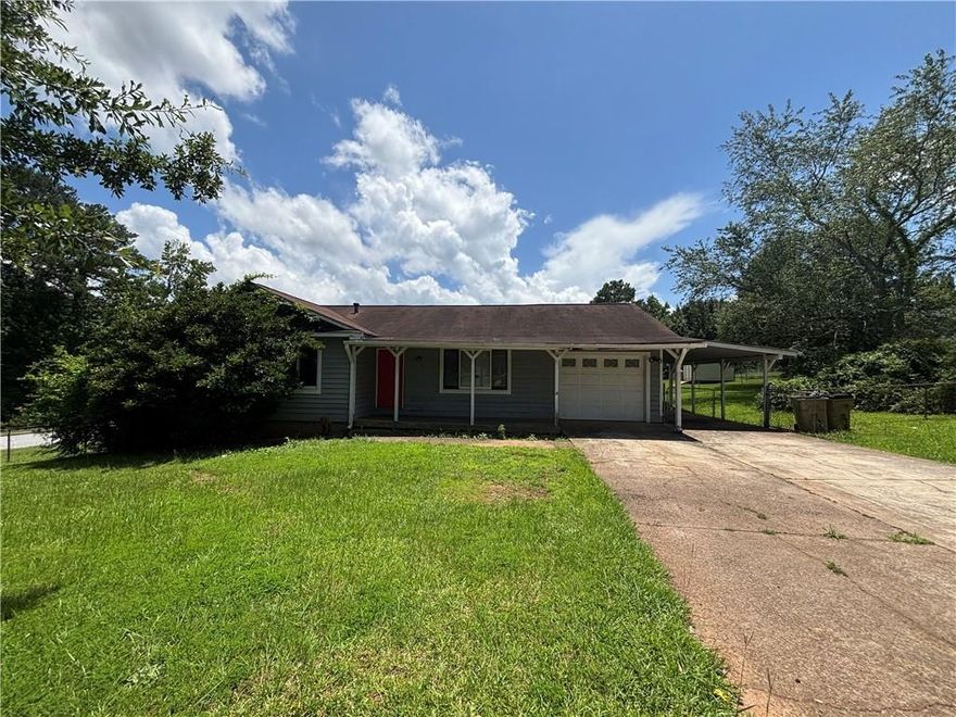 Welcome to this charming split-level home tucked into a peaceful residential community in Rex. The layout offers flexible living with a bright main level, spacious family room, and well-sized bedrooms ideal for both privacy and comfort. A lower-level bonus area provides extra room for entertaining, a home office, or workout space. The backyard is private and tree-lined—perfect for outdoor gatherings or quiet relaxation. Whether you’re a first-time buyer or looking for an investment opportunity, this property offers space, potential, and convenience in one package. Located near shopping, dining, and major highways for easy commuting. This home has been virtually staged to illustrate its potential.