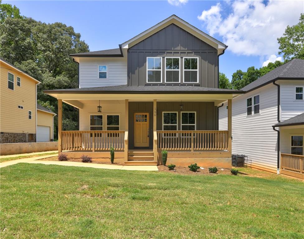 You don’t want to miss this stunning new construction home featuring 4 spacious bedrooms and 3 full bathrooms, designed with impeccable attention to detail. Step inside and be captivated by the open-concept floor plan, complete with hardwood floors throughout. The large living room boasts custom woodwork, adding character and warmth to the space. The chef’s kitchen is a true showstopper, equipped with quartz countertops, white shaker-style cabinets, and plenty of room for cooking and entertaining. The main level includes an oversized bedroom and a luxury bathroom, offering convenience and flexibility. Upstairs, the owners suite serves as a private oasis, featuring a spa-like en-suite bathroom with a HUGE walk-in shower, a freestanding soaking tub, dual vanities, and a spacious walk-in closet. The additional bedrooms are versatile and generously sized, making them perfect for family, guests, or a home office.Outside, the well-sized backyard is ideal for relaxation, gardening, or hosting gatherings. The contemporary design of the home extends to its charming exterior, complete with a welcoming front porch that adds to its curb appeal.
