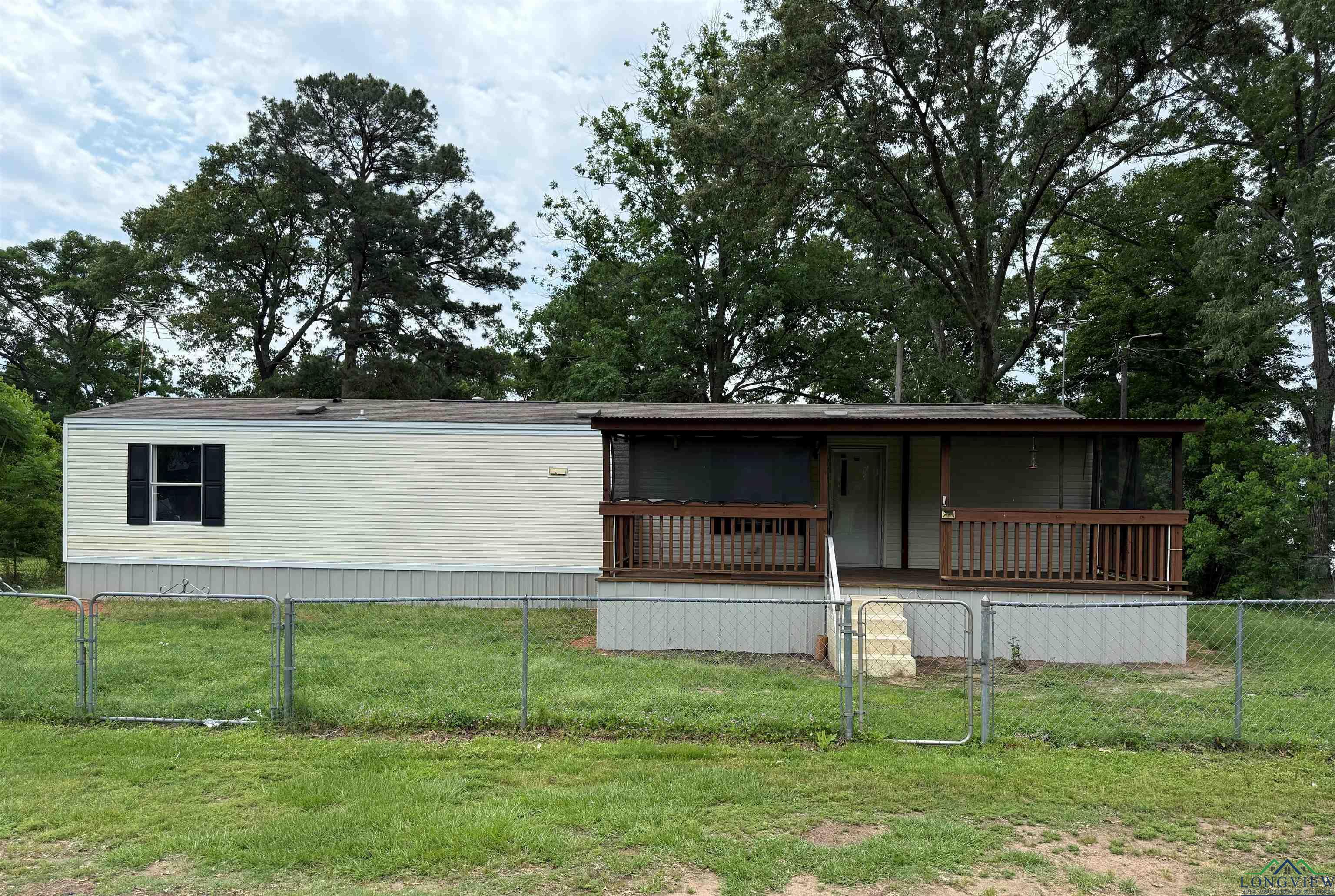 240 SW Cross Place, Avinger, Texas image 1