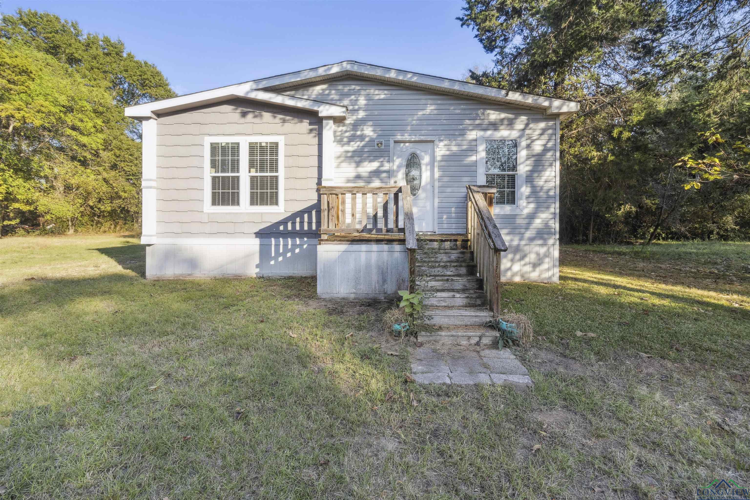 208 S Sun Camp Road, White Oak, Texas image 1