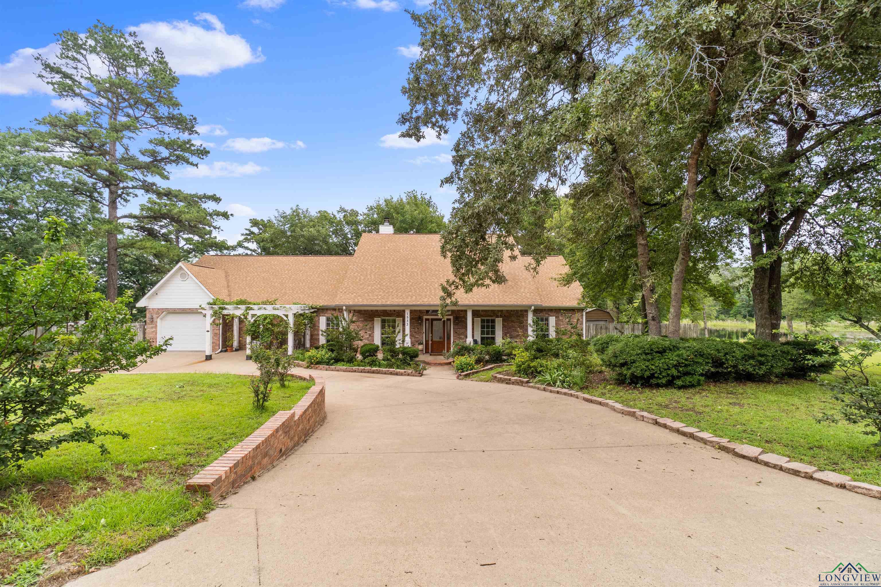 1533 Raintree Lake Circle, Big Sandy, Texas image 1