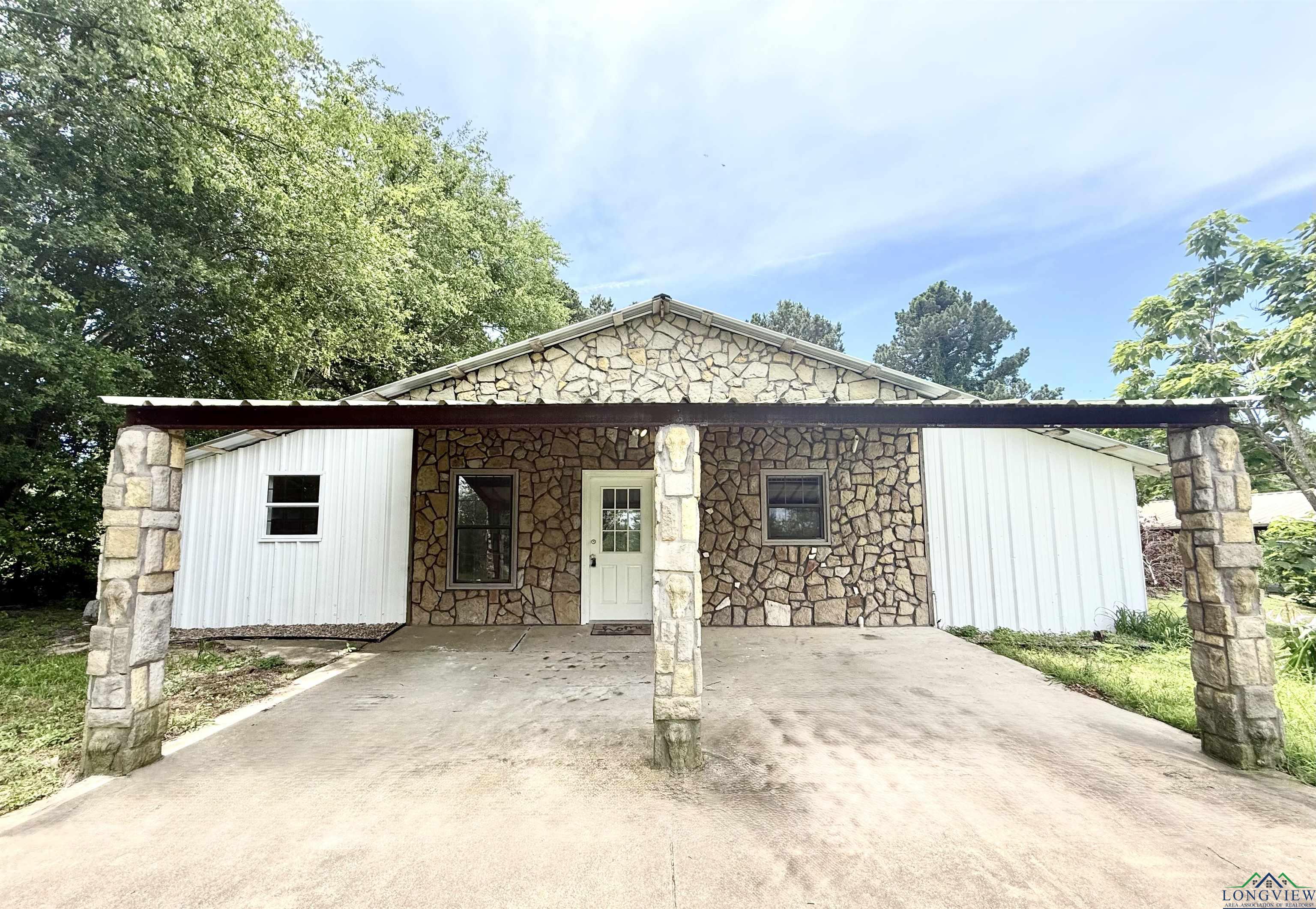 1435 W Tom Smith Road, Harleton, Texas image 1