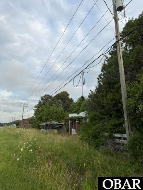 Photo of 8028 Caratoke Highway, Powells Point, NC 27966 (MLS # 133050)