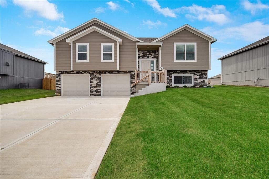 Photo of 605 Foxglove Lane, Raymore, MO 64083 (MLS # 2618970)