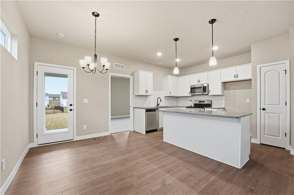 Photo of 12428 S Aspen Lane, Lees Summit, MO 64086 (MLS # 2598694)