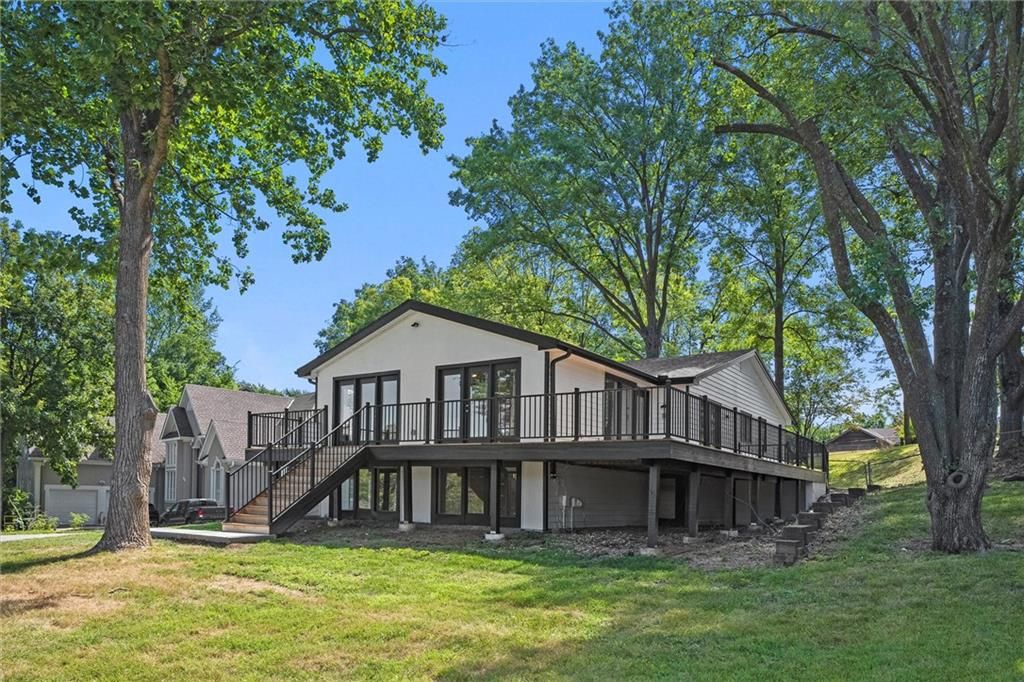 Photo of 7809 NW Scenic Drive, Weatherby Lake, MO 64152 (MLS # 2608243)