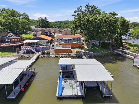 Photo of 2202 Spring Cove Road, Sunrise Beach, MO 65079 (MLS # 2626524)