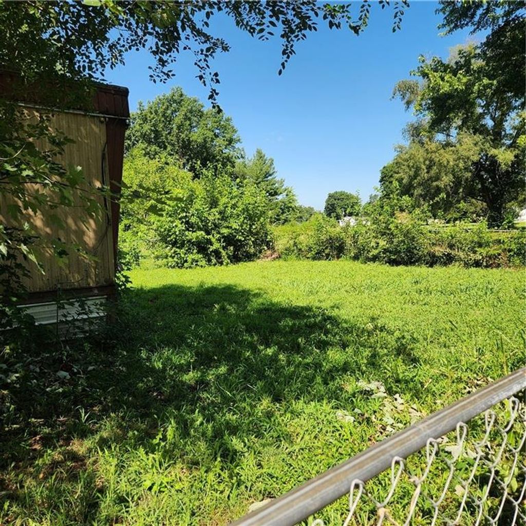 Photo of 200 W 5th Street, Henrietta, MO 64036 (MLS # 2632485)