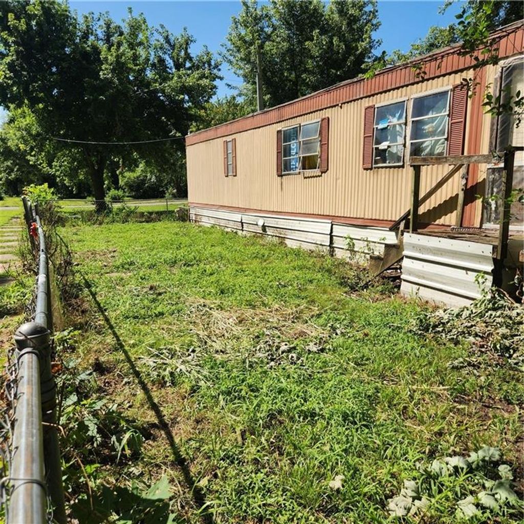 Photo of 200 W 5th Street, Henrietta, MO 64036 (MLS # 2632485)