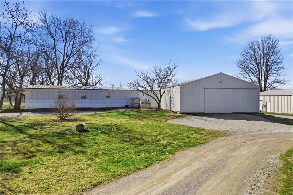 Photo of 601 Gano Street, Missouri City, MO 64072 (MLS # 2608219)