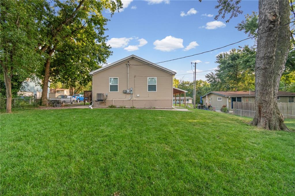 Photo of 1108 NE 52nd Terrace, Kansas City, MO 64118 (MLS # 2643102)