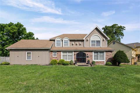 Photo of 12420 Cambridge Avenue, Grandview, MO 64030 (MLS # 2628829)