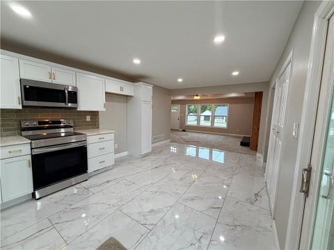 Photo of 605 NE Douglas Street, Lees Summit, MO 64063 (MLS # 2633162)