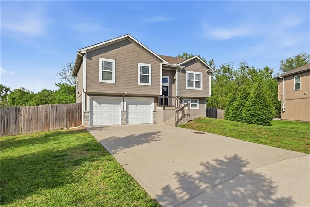 Photo of 404 Timbercreek Drive, Belton, MO 64083 (MLS # 2618365)