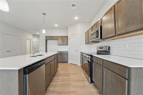 Photo of 409 SW Redbud Court, Blue Springs, MO 64014 (MLS # 2581733)