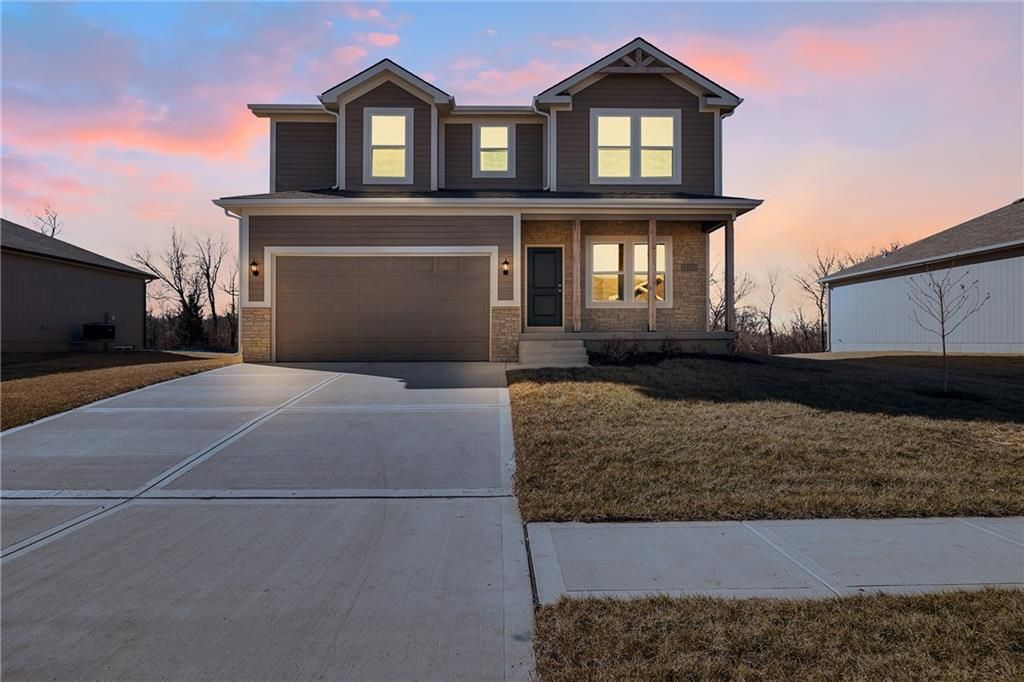 Photo of 2523 SW Mitchell Street, Oak Grove, MO 64075 (MLS # 2618960)