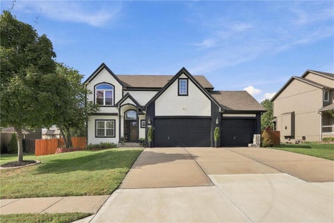 Photo of 110 S Eastglen Drive, Raymore, MO 64083 (MLS # 2644051)