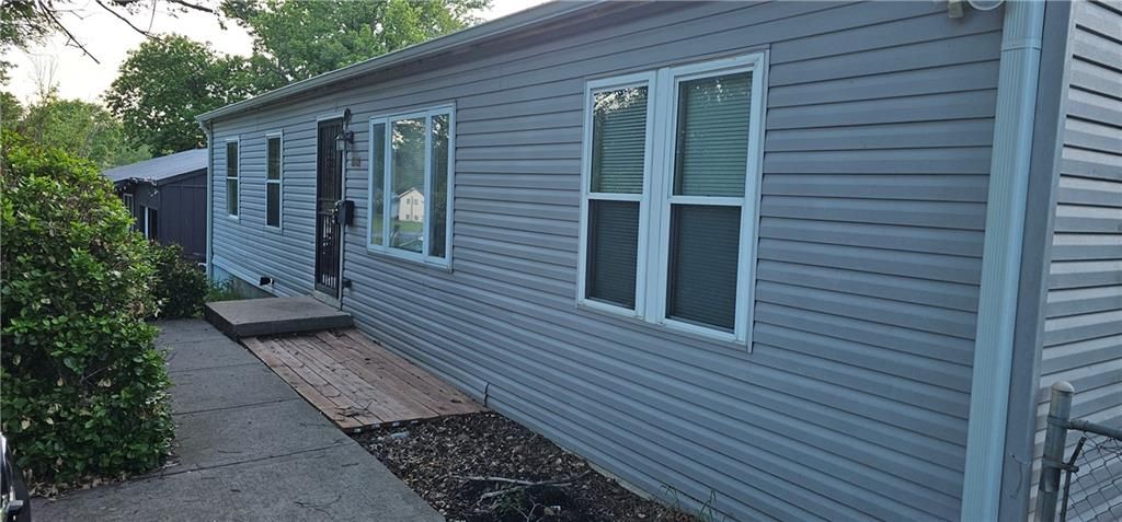 Photo of 6306 E 152nd Street, Grandview, MO 64030 (MLS # 2619097)