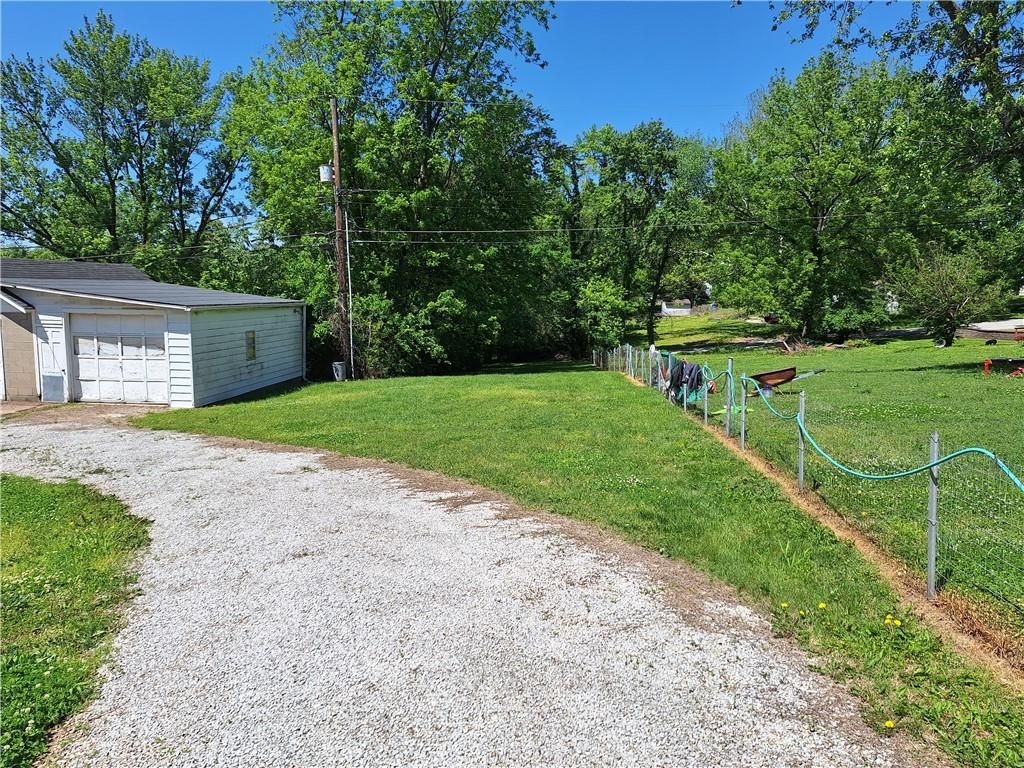 Photo of 210 N Glenwood Avenue, Sugar Creek, MO 64053 (MLS # 2618308)