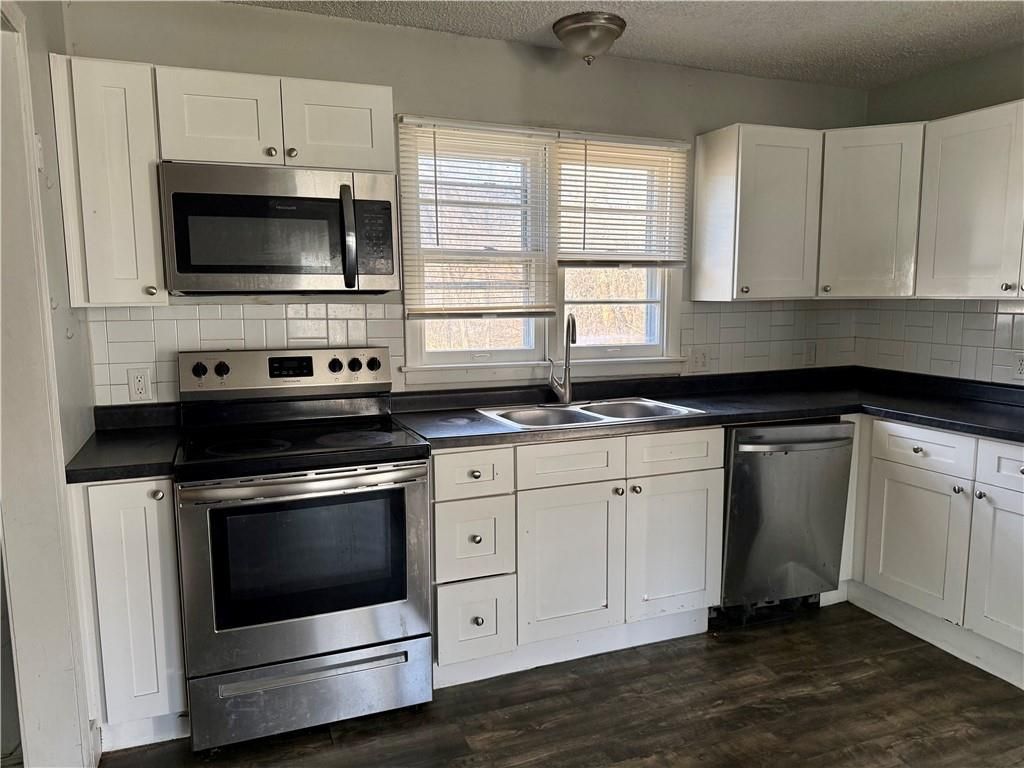 Photo of 9822 E Independence Avenue, Independence, MO 64053 (MLS # 2607755)