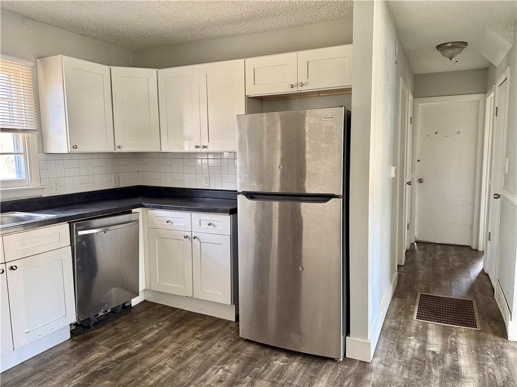 Photo of 9822 E Independence Avenue, Independence, MO 64053 (MLS # 2607755)