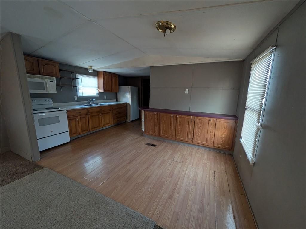 Photo of 203 W 4th Street, Henrietta, MO 64063 (MLS # 2599107)