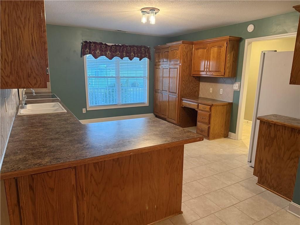 Photo of 905 MERCURY Way, Raymore, MO 64083 (MLS # 2608097)