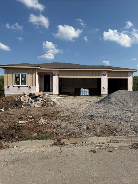 Photo of 833 Reed Drive, Raymore, MO 64083 (MLS # 2643731)