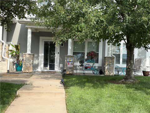Photo of 11721 S ROUNDTREE #103 Street, Olathe, KS 66061 (MLS # 2634414)