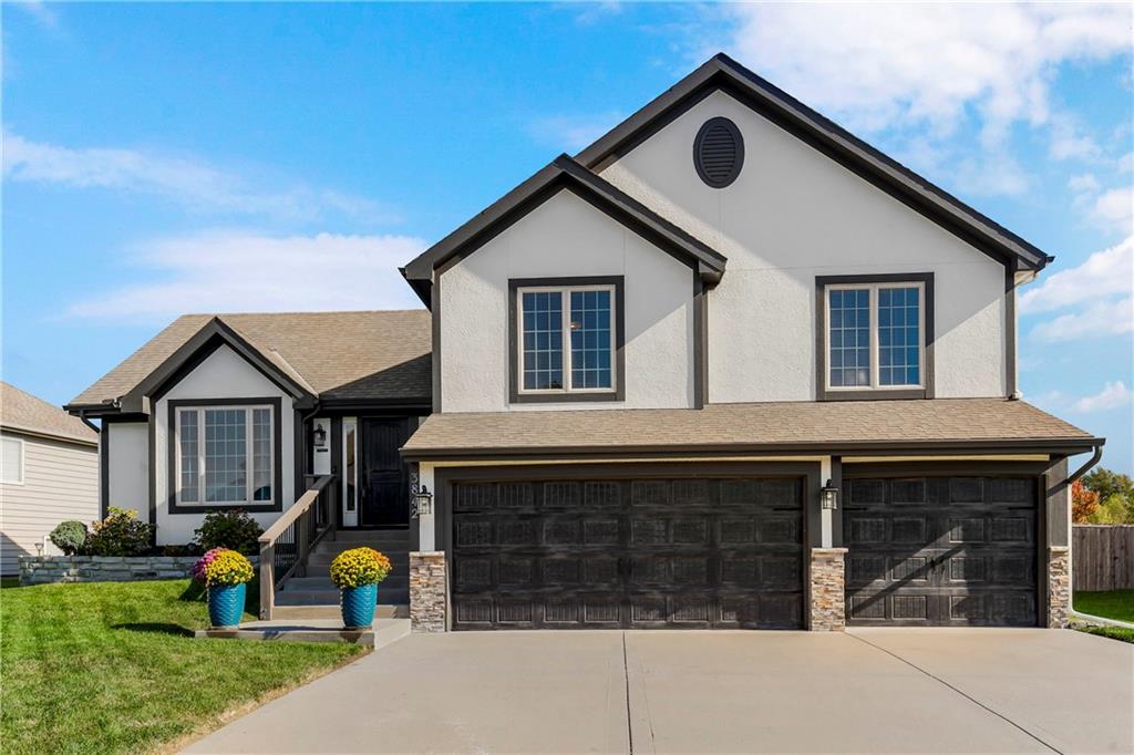 View of front of house with a garage
