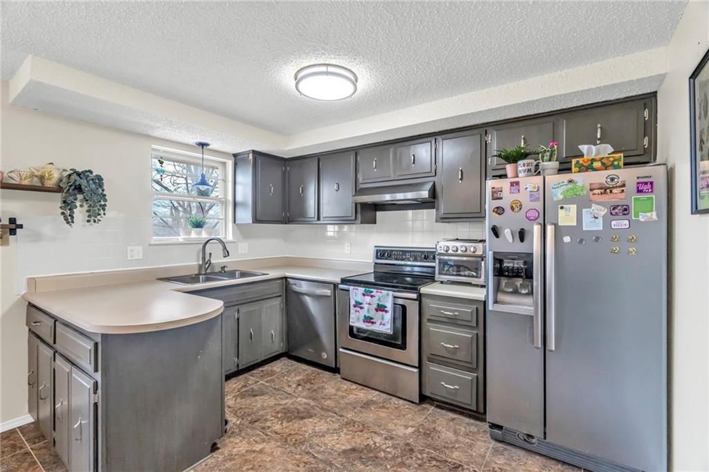 Photo of 5016 N Bellaire Avenue, Kansas City, MO 64119 (MLS # 2591767)