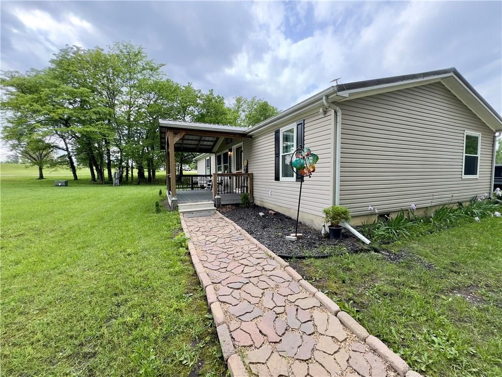 Photo of 1981 SW State Route 2 Highway, Garden City, MO 64747 (MLS # 2618481)