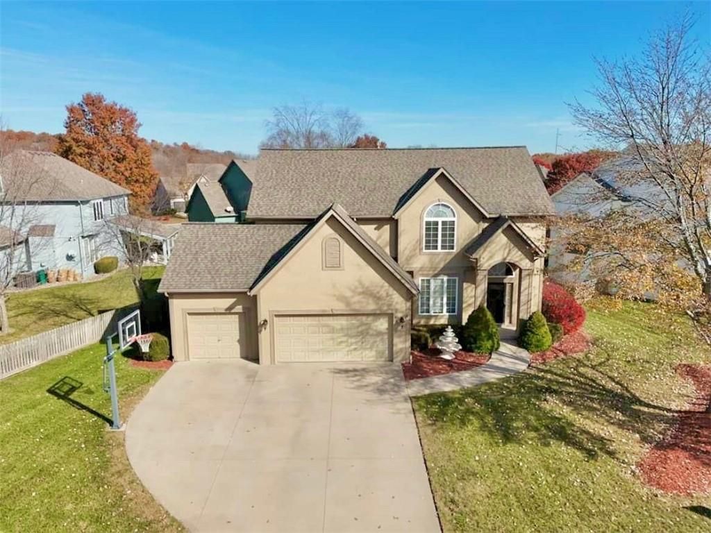 Photo of 304 NE Hidden Valley Way, Lees Summit, MO 64064 (MLS # 2619059)