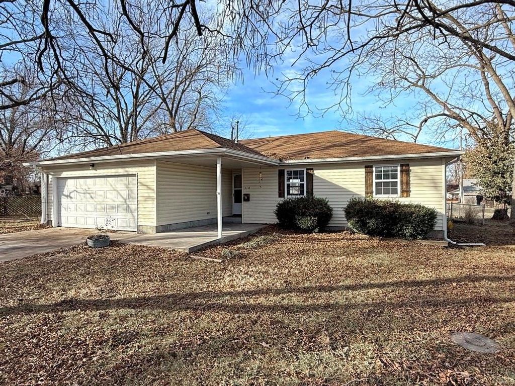 Photo of 310 S Forest Street, El Dorado Springs, MO 64744 (MLS # 2592505)