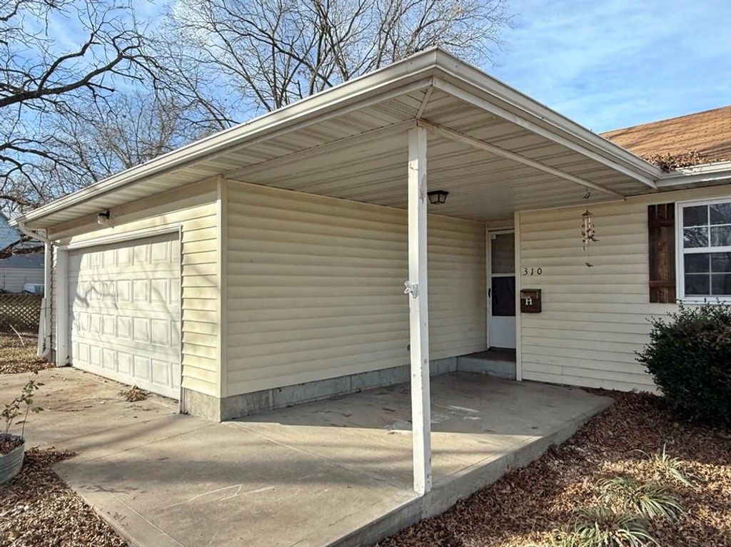 Photo of 310 S Forest Street, El Dorado Springs, MO 64744 (MLS # 2592505)