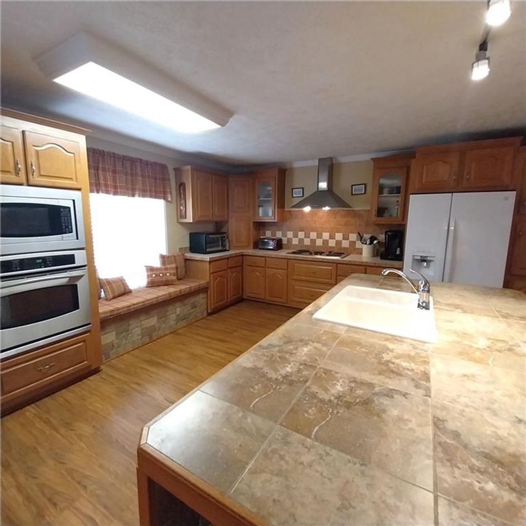 Photo of 715 WW Highway, Osceola, MO 64776 (MLS # 2607395)