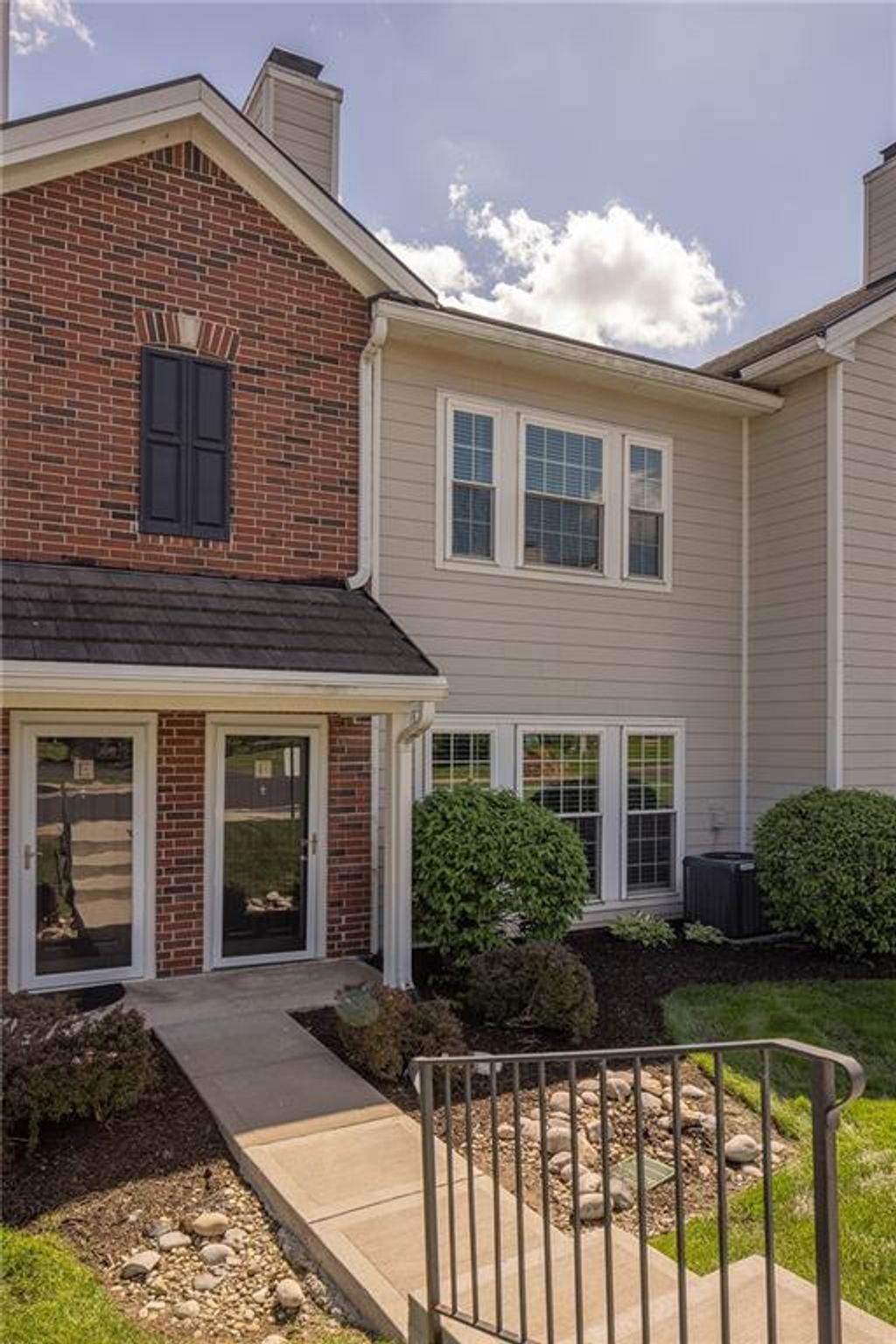 Photo of 11603 Tomahawk Creek Parkway #F, Leawood, KS 66211 (MLS # 2614800)