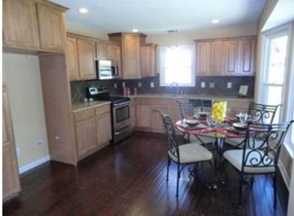 Photo of 10716 BELLAIRE Avenue, Kansas City, MO 64134 (MLS # 2608179)