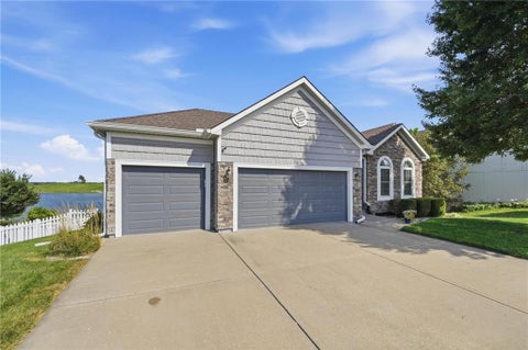 Photo of 615 Johnston Parkway, Raymore, MO 64083 (MLS # 2638571)